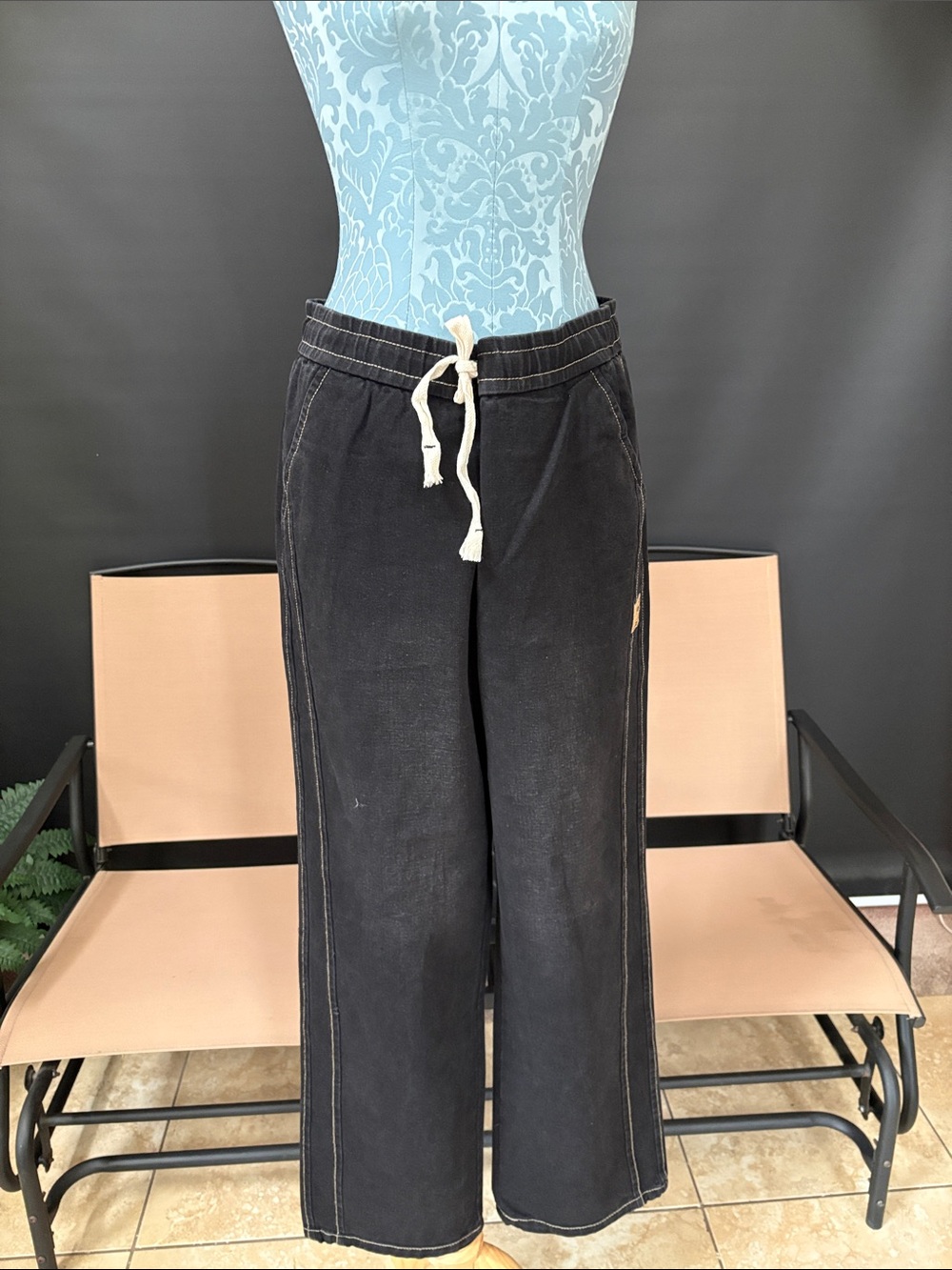 Black Wide-Leg Drawstring denim slacks.